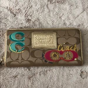 COACH zip around wallet